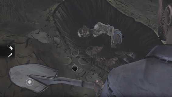 Kuva 8. Pelaajahahmo hautaa zombia The Walking Dead -pelissä.
